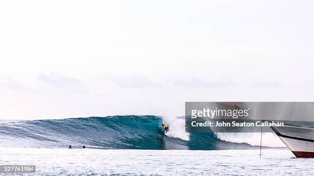 surfing at katiet village - mentawai islands stock pictures, royalty-free photos & images