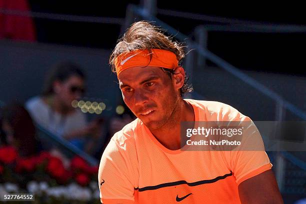 Rafael Nadal of Spain leaps into the air to play a forehand against Andrey Kuznetsov of Russia in their second round match during day four of the...