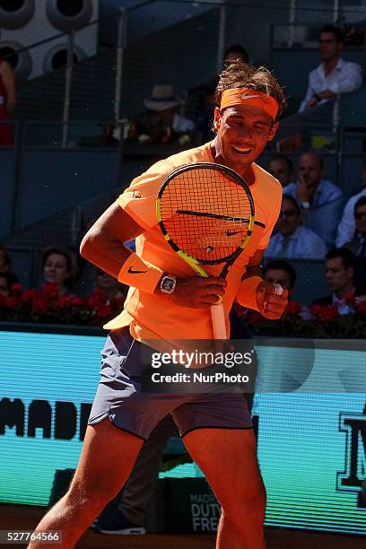 Rafael Nadal of Spain leaps into the air to play a forehand against Andrey Kuznetsov of Russia in their second round match during day four of the...