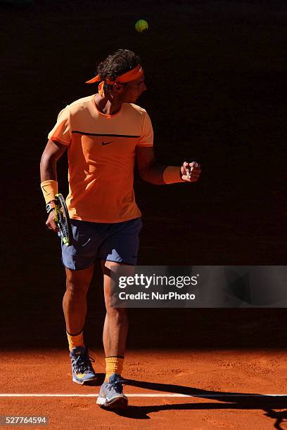 Rafael Nadal of Spain leaps into the air to play a forehand against Andrey Kuznetsov of Russia in their second round match during day four of the...