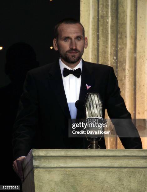 Actor Christopher Ecclestone recites on stage at "A Party To Remember", a free concert celebrating the 60th anniversary of VE Day, in Trafalgar...