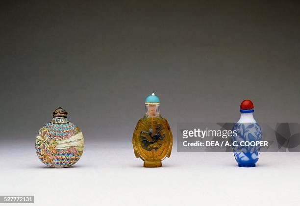 Painted glass and enamel snuff bottles. China, 18th century.