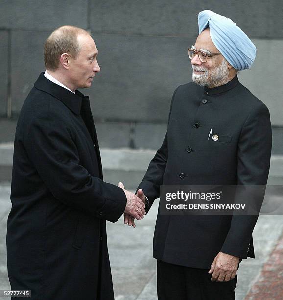 Russian Federation: Russian President Vladimir Putin greets Indian Prime Minister Manmohan Singh before attending the military parade 09 May 2005 on...