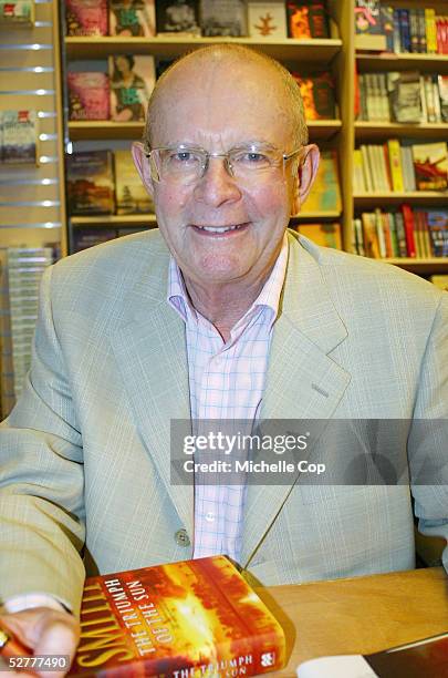 Author Wilbur Smith signs copies of his latest book "The Triumph of the Sun" at Dymocks Book Store Mid City on May 9, 2005 in Sydney, Australia.