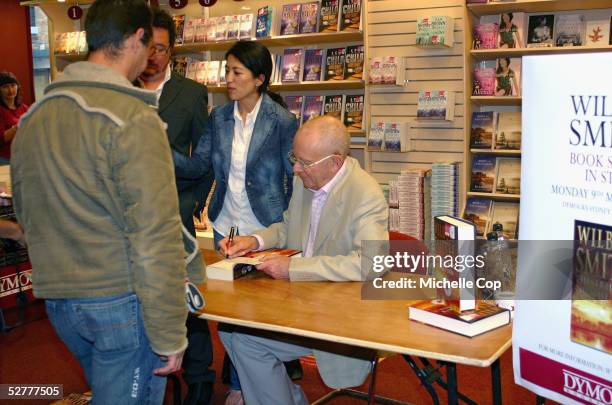 Author Wilbur Smith signs copies of his latest book "The Triumph of the Sun" at Dymocks Book Store Mid City on May 9, 2005 in Sydney, Australia.