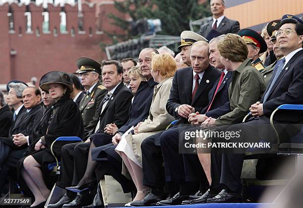 Japanese Prime Minister Junichiro Koizumi, Italian Prime Minister Silvio Berlusconi, an unidentified woman, German Chancellor Gerhard Schroeder and...