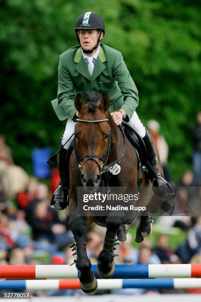 Marcus Ehning of Germany jumps on his horse Sandro Boy during the Hasseroeder championship of Hamburg of the German Jumping and Dressage Grand Prix...