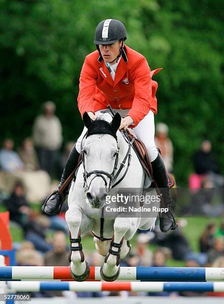 Christian Ahlmann of Germany on his horse Coester during the Hasseroeder championship of Hamburg of the German Jumping and Dressage Grand Prix at the...