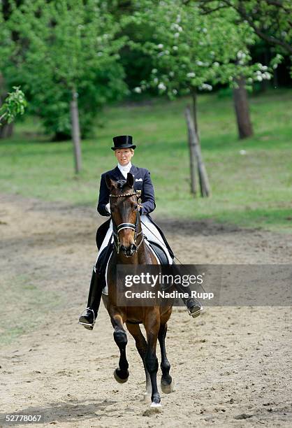 Heike Kemmer of Germany rides her horse Ferragamo during the dressage of HypoVereinsbank of the German Jumping and Dressage Grand Prix at the Derby...