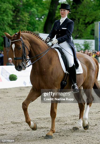 Kristy Oatley of Australia rides her horse Donovan-Bailey during the German dressage Derby 2005 of the German Jumping and Dressage Grand Prix at the...