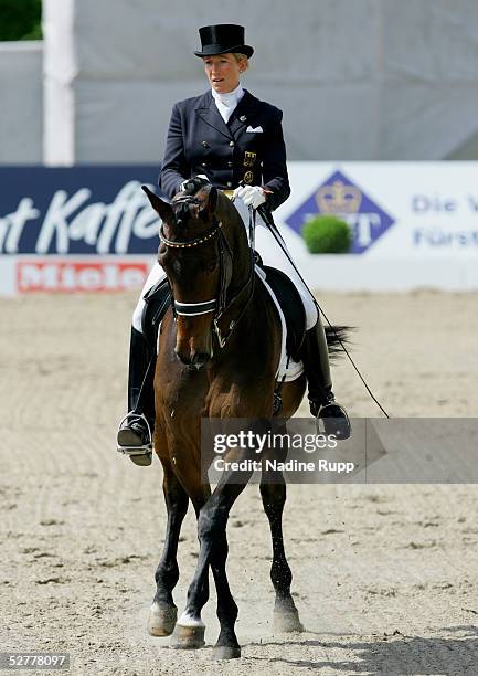 Heike Kemmer of Germany rides her horse Ferragamo during the dressage of HypoVereinsbank of the German Jumping and Dressage Grand Prix at the Derby...