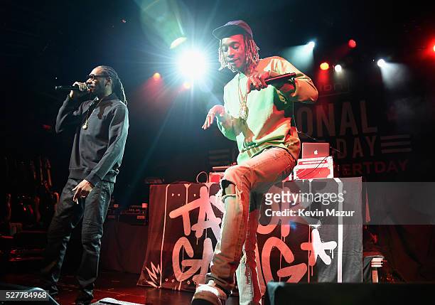 Rappers Snoop Dogg and Wiz Khalifa perform onstage during the 2nd Annual National Concert Day presented by Live Nation at Irving Plaza on May 3, 2016...