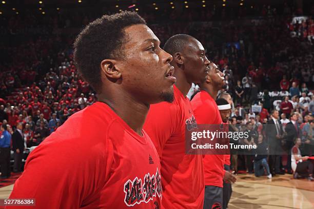 The Toronto Raptors stand for a moment of silence for the national anthem before the game against the Indiana Pacers in Game Seven of the Eastern...