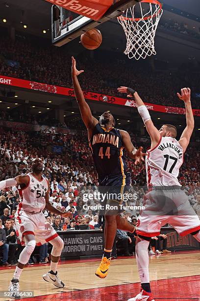 Solomon Hill of the Indiana Pacers shoots a layup during the game against Jonas Valanciunas of the Toronto Raptors in Game Seven of the Eastern...