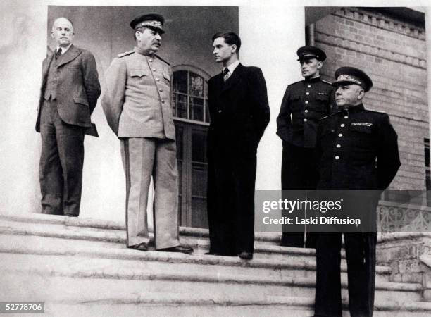 Russian statesmen at the Tehran Conference, November 1943. Joseph Stalin , Valentin Bereskov , Dmitrij Kuzmichov and Kliment Voroshilov .
