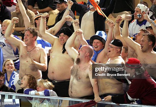 Latvia and Finland fans cheer on their teams in the third period of the IIHF World Men's Championships qualifying round game on May 9, 2005 at the...