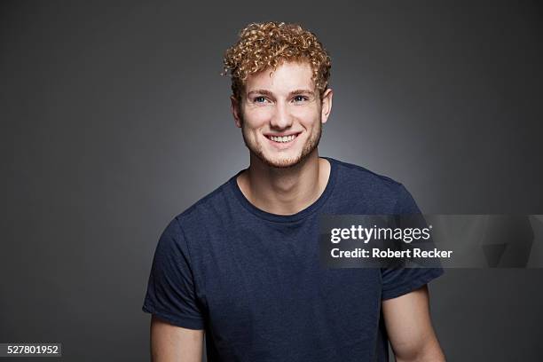 portrait of young man smiling - looking away stock pictures, royalty-free photos & images