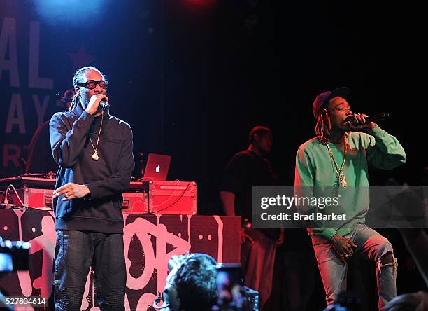 Musician Snoop Dogg and Wiz Khalifa perform at the 2nd Annual National Concert Day Show at Irving Plaza on May 3, 2016 in New York City.