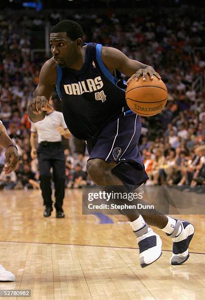 Michael Finley of the Dallas Mavericks drives against the Phoenix Suns in Game one of the Western Conference Semifinals during the 2005 NBA Playoffs...