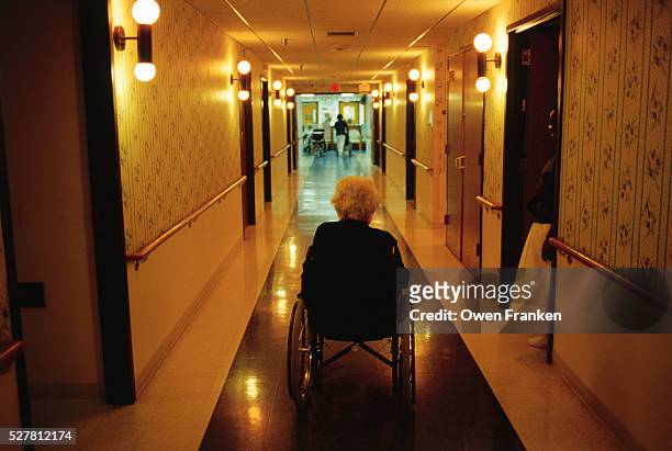 elderly woman in assisted care home - elderly care stock pictures, royalty-free photos & images