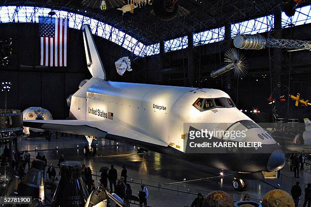 This 28 March, 2005 photo shows the space shuttle Enterprise on display at the Smithsonian's Air and Space Museum Steven F. Udvar-Hazy Center in...