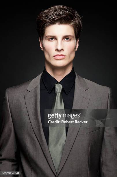 portrait of attractive young businessman - hair part stock-fotos und bilder