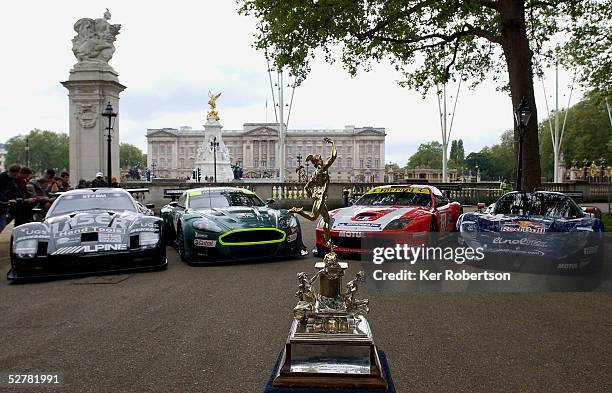 The Lister Storm, Aston Martin Racing DBR9, Larbre Ferrari 550 Maranello and the JMB Racing Maserati MC12 with the Tourist Trophy in the foreground...