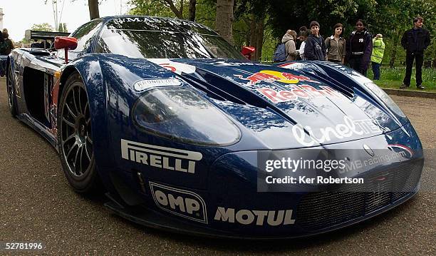 Children get a glimpse of the JMB Racing Maserati MC12 at the F.I.A. GT Championship demonstration event in The Mall near Buckingham Palace on May...