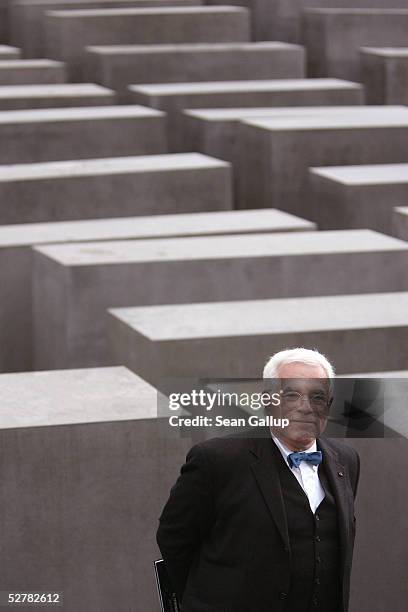 American architect Peter Eisenman smiles as he walks through the stellae of the Holocaust Memorial during its official opening May 10, 2005 in...