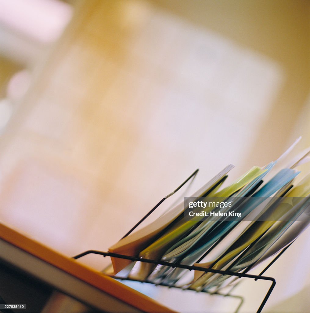 Files In A Rack Graphics File Folders In Rack On Desk High-Res Stock Photo - Getty Images