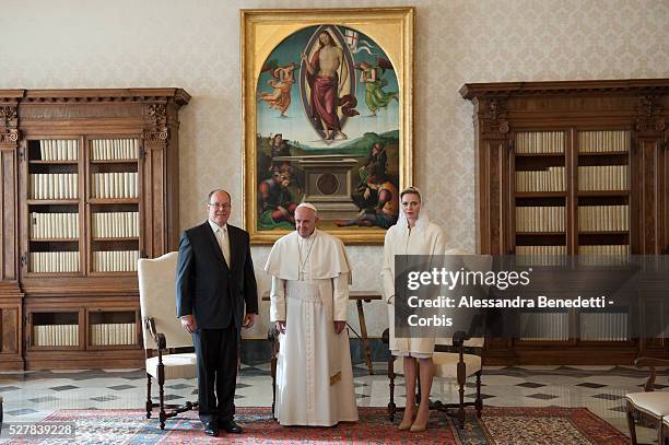 Pope Francis meets Prince Albert II of Monaco and his wife Princess Charlene during a private audience at the Vatican.