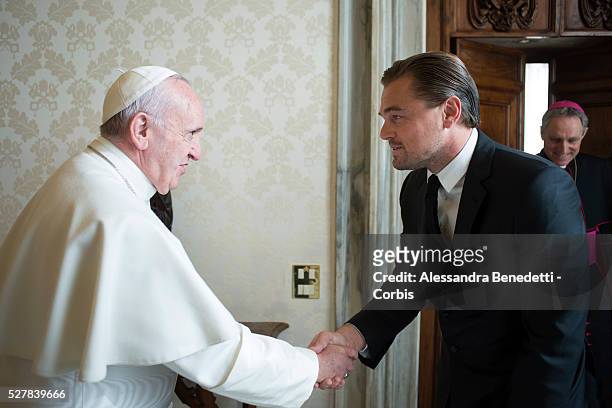 Leonardo DiCaprio met with Pope Francis at the Vatican on January 28 2016 and was presented with leather-bound copies of the Pope's two...