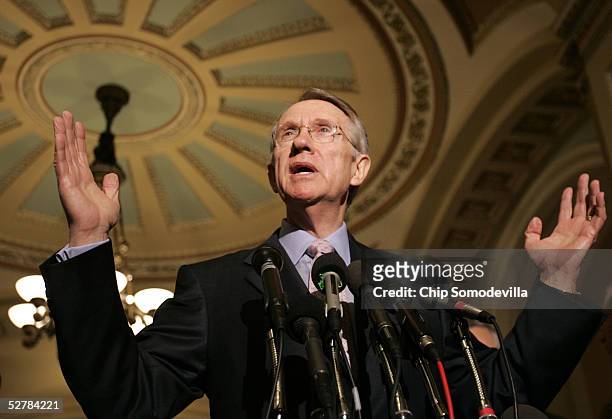 Senator Harry Reid gestures as he speaks with the media on Capitol Hill May 10, 2005 in Washington, DC. The Senate Democratic Policy Committee held...