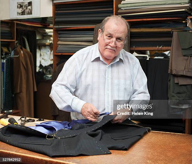 tailor at work - tailor stock pictures, royalty-free photos & images