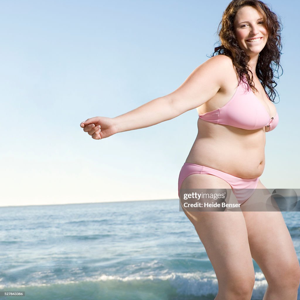 Woman Dancing on Beach