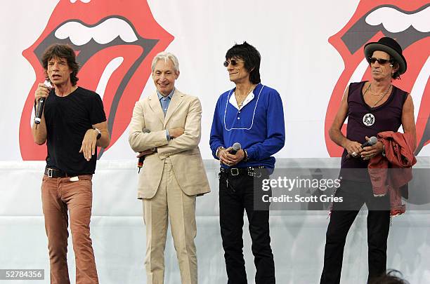 Mick Jagger, Charlie Watts, Ron Wood, and Keith Richards of The Rolling Stones talk to reporters during a press conference to announce a world tour...