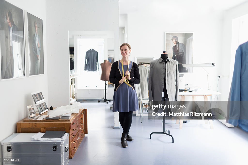 Fashion designer in her atelier