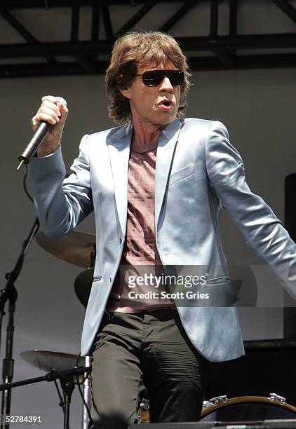 Mick Jagger of The Rolling Stones performs onstage during a press conference to announce a world tour at the Julliard Music School May 10, 2005 in...