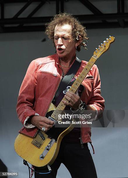 Keith Richards of The Rolling Stones performs onstage during a press conference to announce a world tour at the Julliard Music School May 10, 2005 in...