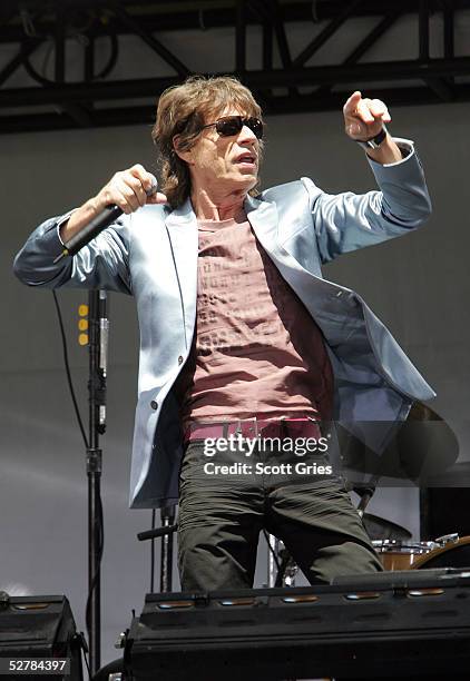 Mick Jagger of The Rolling Stones performs onstage during a press conference to announce a world tour at the Julliard Music School May 10, 2005 in...
