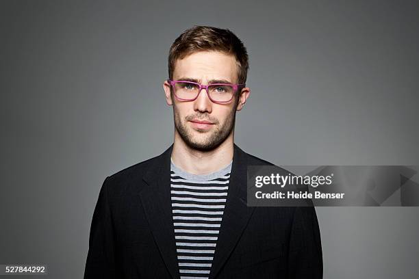 portrait of young man with glasses - blonde man in suit stock pictures, royalty-free photos & images