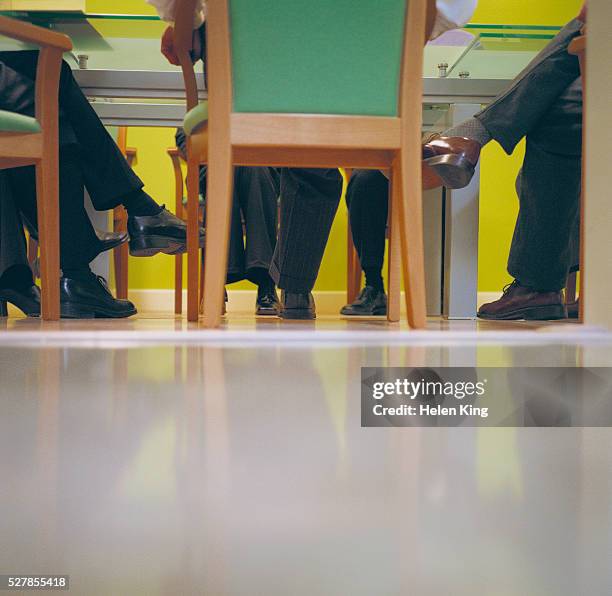 Working Under Table 249 Legs Under Table Stock Photos, High-Res Pictures, and Images ...