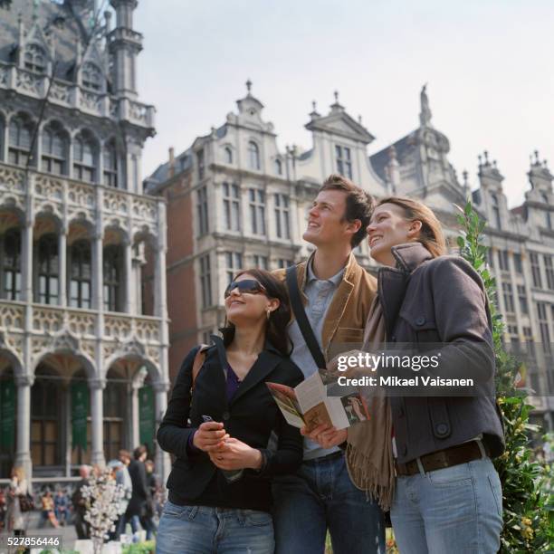 friends out sightseeing - brussels square stock pictures, royalty-free photos & images