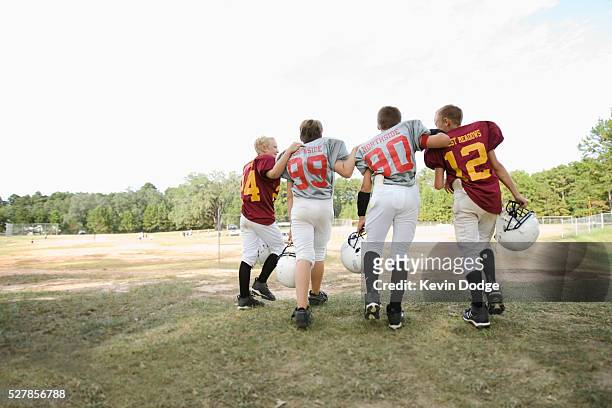 after the football game - american football strip stock pictures, royalty-free photos & images