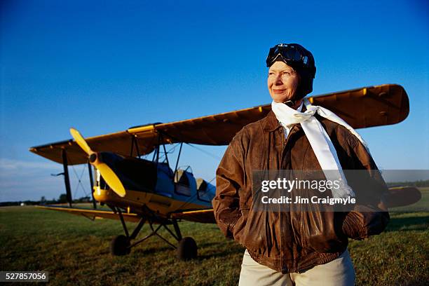 senior woman with 1937 tiger moth - aviation hat stock pictures, royalty-free photos & images