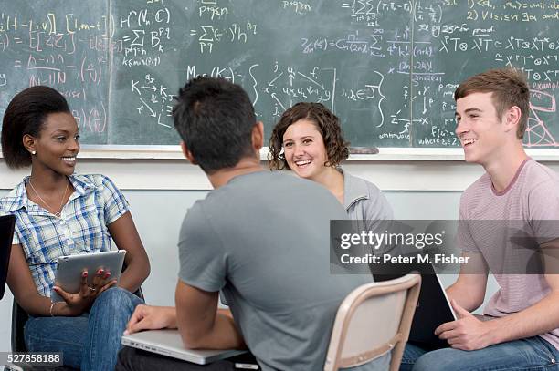 group of students (16-18 years) in classroom laughing - 18 19 years photos stock pictures, royalty-free photos & images
