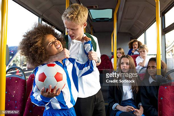 schoolbus bully - soccer uniform stockfoto's en -beelden