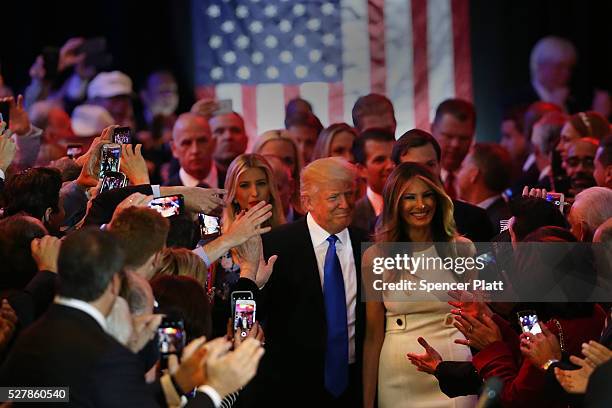 Republican presidential candidate Donald Trump and his wife Melania Trump arrive to speak to supporters at Trump Tower in Manhattan following his...