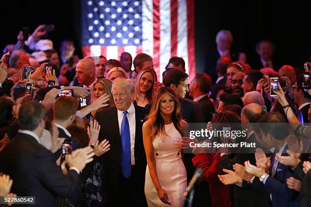 Republican presidential candidate Donald Trump and his wife Melania Trump arrive to speak to supporters at Trump Tower in Manhattan following his...