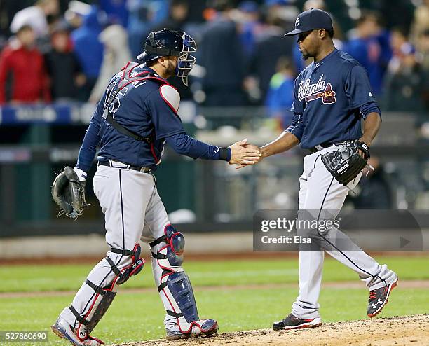 Pierzynski and Arodys Vizcaino of the Atlanta Braves celebrate the 3-0 win over the New York Mets at Citi Field on May 3, 2016 in the Flushing...